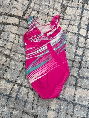 GK Elite BREAST CANCER AWARENESS Gymnastics LEOTARD Pink “BY HER SIDE” Size: CL